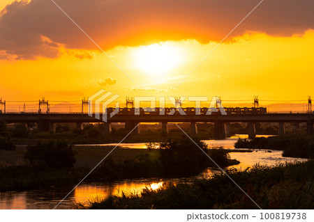bridge over river at sunset bridge over river at sunset 100819738