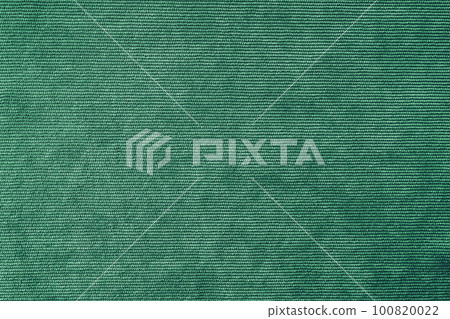 Green velveteen upholstery fabric texture background. Green velveteen upholstery fabric texture background. 100820022