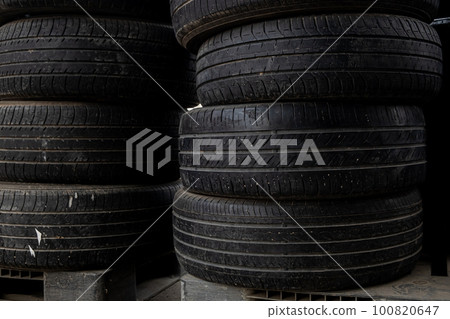 Stacked Old Tires in the Automotive Garage Service, Used Old Tires Background Stacked Old Tires in the Automotive Garage Service, Used Old Tires Background 100820647