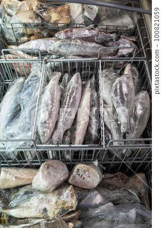 Frozen Seafood in fridge at the fish market. 100821059