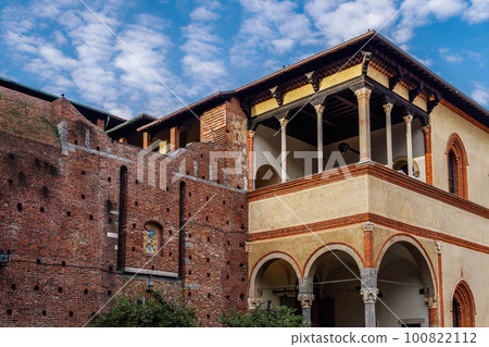 Milan, Italy Ducal Courtyard low angle day view of Sforzesco Castle - Castello Sforzesco - Medieval apartments residence, the loggia of Galeazzo Maria Sforza against puffy clouds sky. Milan, Italy Ducal Courtyard low angle day view of Sforzesco Castle - Castello Sforzesco - Medieval apartments residence, the loggia of Galeazzo Maria Sforza against puffy clouds sky. 100822112