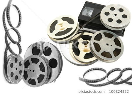 Film reel and video cassette isolated on white . Collage. Film reel and video cassette isolated on white . Collage. 100824322