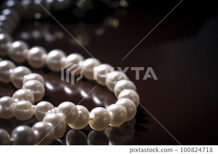 Beautiful pearl necklace, black background Beautiful pearl necklace, black background 100824718