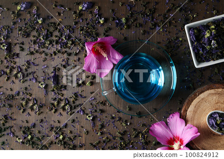 Concept of tasty hot drink, Anchan tea, top view Concept of tasty hot drink, Anchan tea, top view 100824912