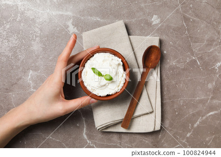 Concept of tasty dairy product - ricotta cheese, top view Concept of tasty dairy product - ricotta cheese, top view 100824944