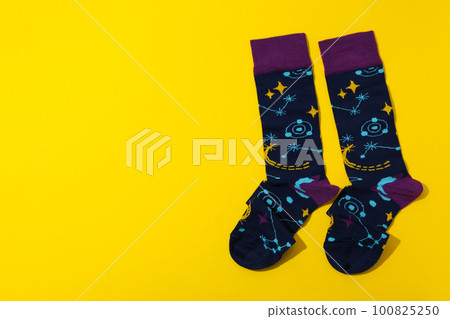 Concept of clothes for legs - socks, space for text Concept of clothes for legs - socks, space for text 100825250