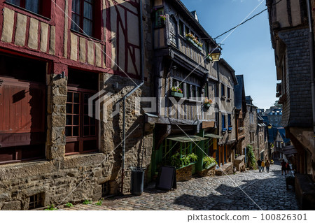 Breton Village Dinan With Narrow Alleys And Half-Timbered Houses In Department Ille et Vilaine In Brittany, France Breton Village Dinan With Narrow Alleys And Half-Timbered Houses In Department Ille et Vilaine In Brittany, France 100826301