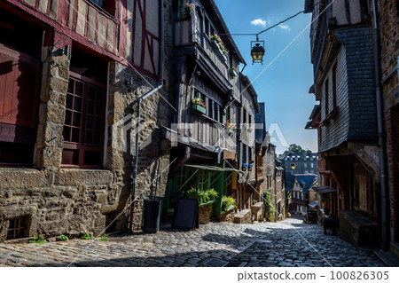 Breton Village Dinan With Narrow Alleys And Half-Timbered Houses In Department Ille et Vilaine In Brittany, France Breton Village Dinan With Narrow Alleys And Half-Timbered Houses In Department Ille et Vilaine In Brittany, France 100826305