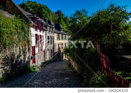 Breton Village Dinan With Narrow Alleys And Half-Timbered Houses In Department Ille et Vilaine In Brittany, France Breton Village Dinan With Narrow Alleys And Half-Timbered Houses In Department Ille et Vilaine In Brittany, France 100826320