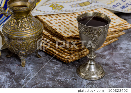 For Passover kosher unleavened matzah bread and kosher kiddush wine for Pesach For Passover kosher unleavened matzah bread and kosher kiddush wine for Pesach 100828402