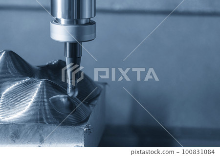 Close up scene the CNC milling machine rough cutting the mold parts by indexable ball tools. Close up scene the CNC milling machine rough cutting the mold parts by indexable ball tools. 100831084
