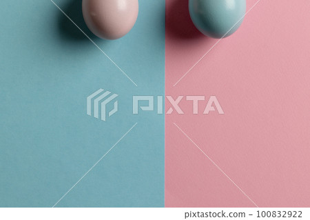 Image of pink and blue easter eggs and copy space on pink and blue background Image of pink and blue easter eggs and copy space on pink and blue background 100832922
