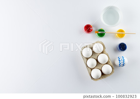 Image of easter eggs, paintbrush and paints with copy space on white background Image of easter eggs, paintbrush and paints with copy space on white background 100832923