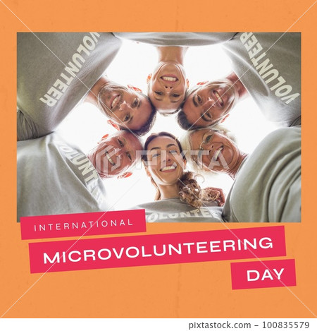 Low angle view of smiling diverse volunteers huddling and international microvolunteering day text Low angle view of smiling diverse volunteers huddling and international microvolunteering day text 100835579