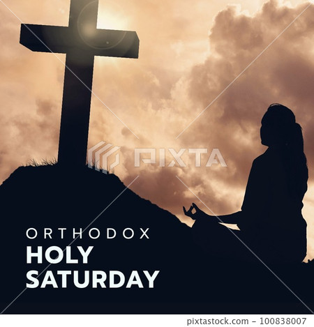 Composition of orthodox holy saturday text and woman praying by christian cross Composition of orthodox holy saturday text and woman praying by christian cross 100838007