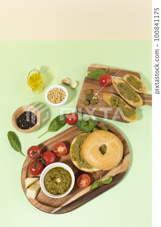 fresh basil pesto and bread 100841175