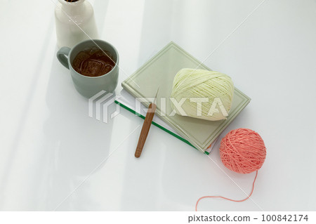 aesthetic photo of handmade, crafting hobbies, knitting thread and book mug aesthetic photo of handmade, crafting hobbies, knitting thread and book mug 100842174
