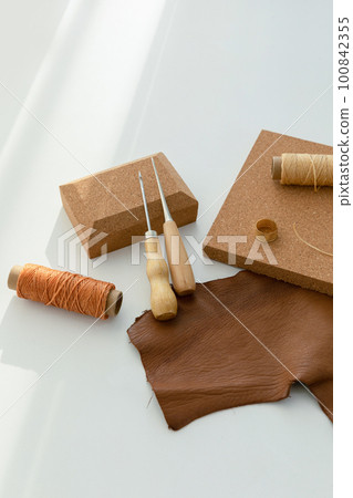 aesthetic photo of handmade, crafting hobbies, leather and awl wax thread 100842355
