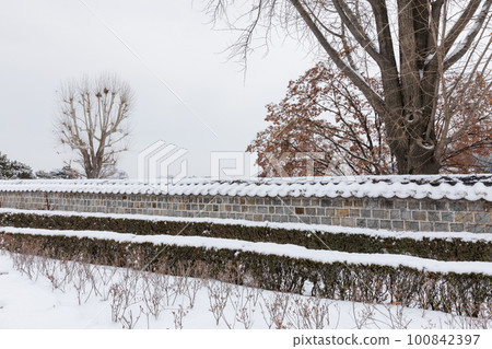 beautiful snowing winter scenery in Suwon Hwaseong Haenggung in Korea beautiful snowing winter scenery in Suwon Hwaseong Haenggung in Korea 100842397