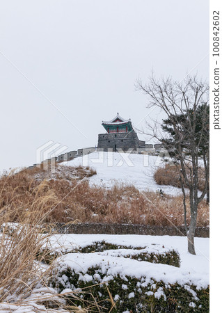 beautiful snowing winter scenery in Suwon Hwaseong Fortress trail in Korea beautiful snowing winter scenery in Suwon Hwaseong Fortress trail in Korea 100842602