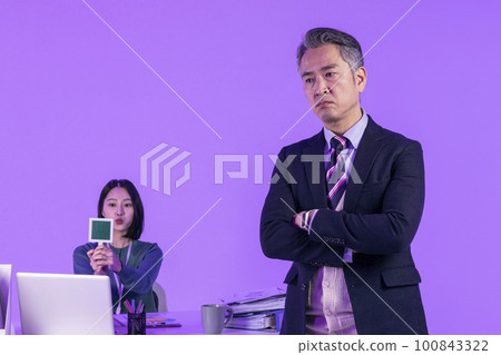 relationship and conflict between younger and older workers concept, Korean Asian young woman and manager level older man 100843322