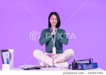 business working concept, young Korean Asian woman praying for miracle 100843481