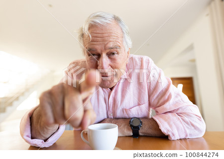 Happy senior caucasian man having video call Happy senior caucasian man having video call 100844274