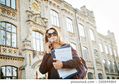 student girl near the university building 100844864