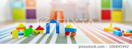 Panoramic background of the colourful blocks in playroom. Panoramic background of the colourful blocks in playroom. 100845942