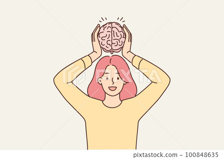Smiling woman hold brain model  100848635
