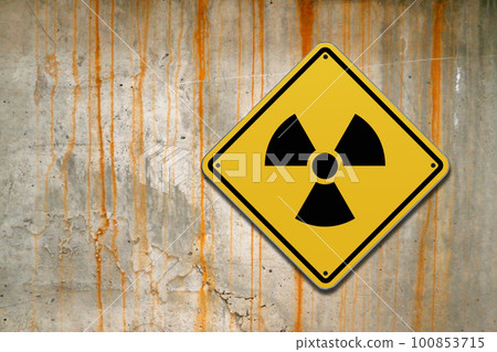 Radioactive warning sign on a wall Radioactive warning sign on a wall 100853715