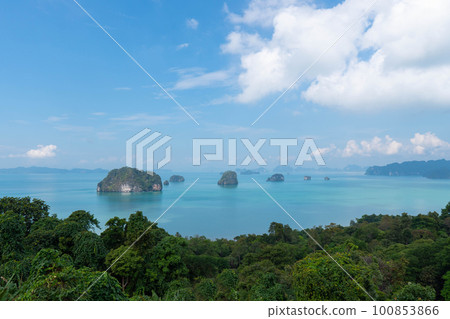 Khaothong view point, view of mountains in Krabi bay with mangrove forest in andaman sea with sunny sky, travel destination in Krabi, Thailand. Khaothong view point, view of mountains in Krabi bay with mangrove forest in andaman sea with sunny sky, travel destination in Krabi, Thailand. 100853866