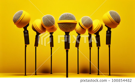 Retro microphone on yellow background Retro microphone on yellow background 100854482