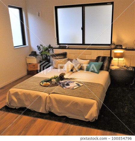 bedroom with bed 100854796