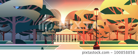 green trees in public summer city park sunset landscape background 100858858