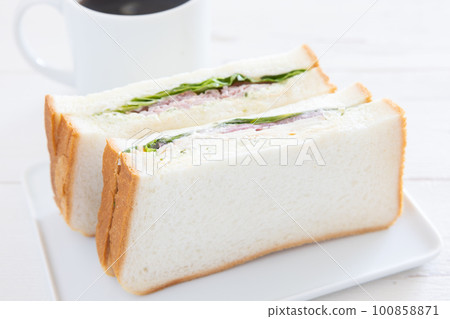 Delicious ham sandwich and hot coffee 100858871