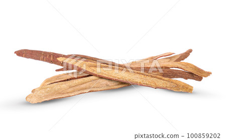 dried liquorice roots on  white background. 100859202