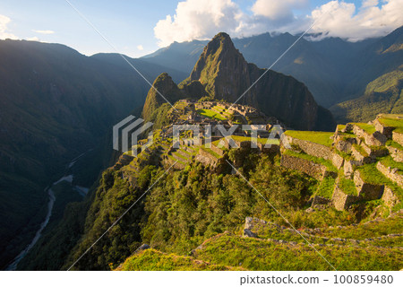 Sunset on Machu Picchu, the lost city of Inca - Peru 100859480