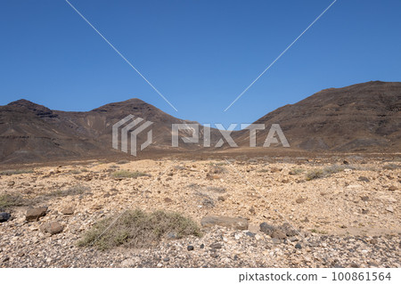 Mountains in Natural Park Jandia, Fuerteventura 100861564