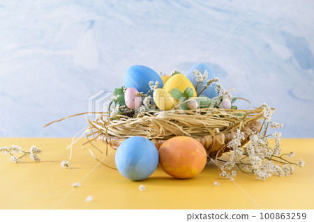 Easter eggs in nest Easter eggs in nest 100863259