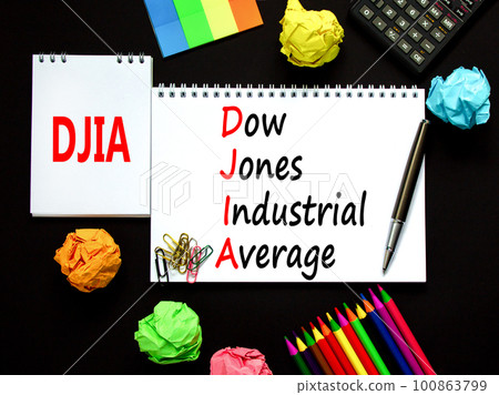 DJIA Dow Jones industrial average symbol. Concept words DJIA Dow Jones industrial average on white note on beautiful black background. Business DJIA Dow Jones industrial average concept. Copy space DJIA Dow Jones industrial average symbol. Concept words DJIA Dow Jones industrial average on white note on beautiful black background. Business DJIA Dow Jones industrial average concept. Copy space 100863799