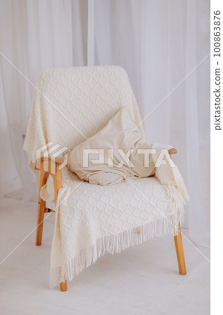 Living room interior design with wooden armchair 100863876