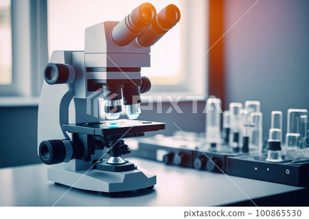 a microscope on your desk in a study or laboratory. a microscope on your desk in a study or laboratory. 100865530