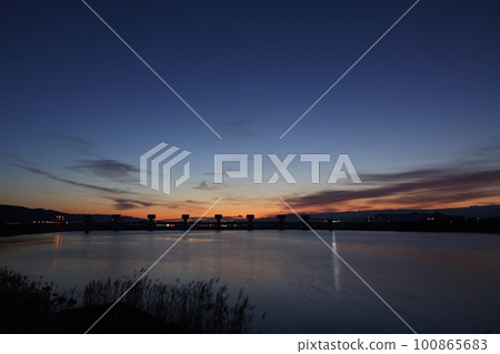 The gradation of the sunrise sky and the reflected river・Spring・230301am The gradation of the sunrise sky and the reflected river・Spring・230301am 100865683