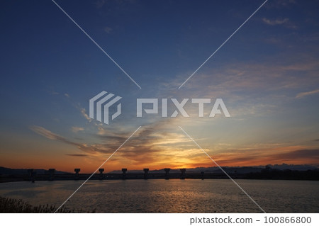 Colorful sunrise sky and reflected river・Spring・230301am 100866800