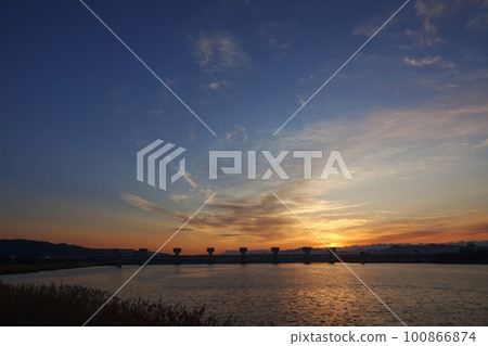 Colorful sunrise sky and reflected river・Spring・230301am 100866874