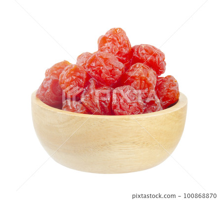 The Dried red prunes fruits (Preserved fruits Chinese plum) in wooden bowl isolated on white background, save clipping path. The Dried red prunes fruits (Preserved fruits Chinese plum) in wooden bowl isolated on white background, save clipping path. 100868870