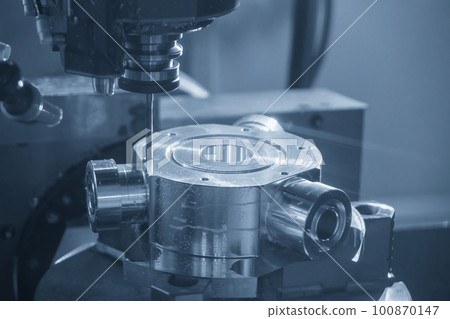 The CNC milling machine hole cutting the automotive parts by drill tools. The CNC milling machine hole cutting the automotive parts by drill tools. 100870147