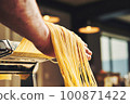 Chef preparing pasta, chef making spaghetti carbonara\ in the kitchen 100871422