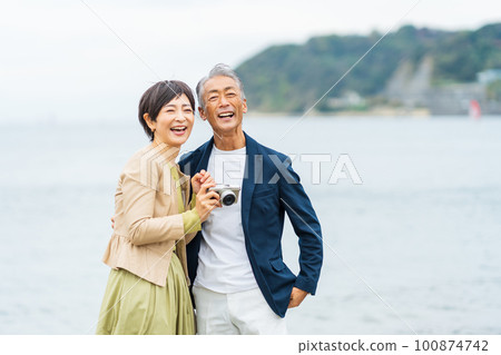 Cuddling senior couple Cuddling senior couple 100874742